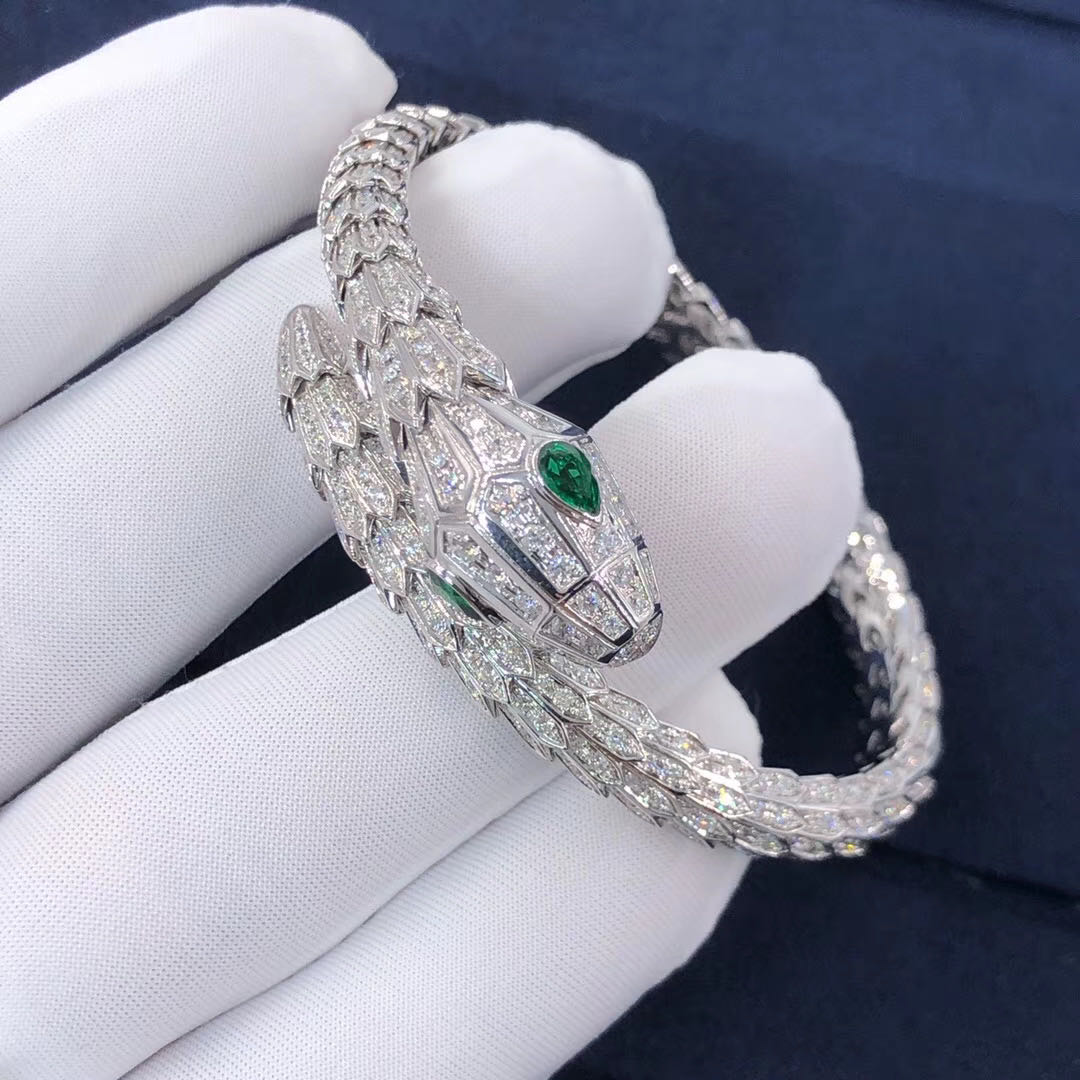Bvlgari Serpenti 18kt white gold bracelet set with pavé diamonds and two emerald eyes
