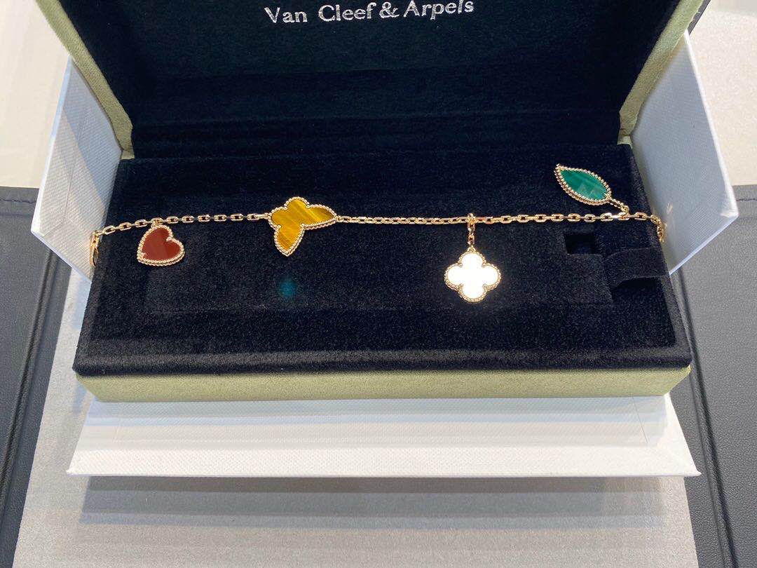 Van Cleef & Arpels Lucky Alhambra Yellow gold bracelet 4 motifs, Mother-of-pearl, Malachite, Tiger Eye, Carnelian